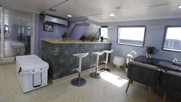 Corniche Yacht Rental Abu Dhabi 92 Shaded outdoor seating area on 75-foot yacht for private group bookings