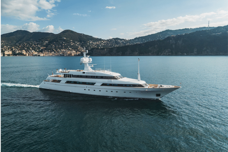 Corporate Yacht Events Abu Dhabi 128 Luxx Prestige 210ft superyacht docked at Yas Marina with trackside views during Abu Dhabi Grand Prix weekend.