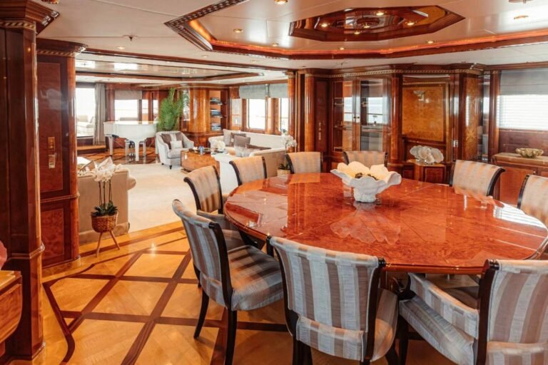 Corporate Yacht Events Abu Dhabi 121 Luxurious indoor saloon of Luxx Beauty 181ft yacht charter with elegant seating and ambient lighting.