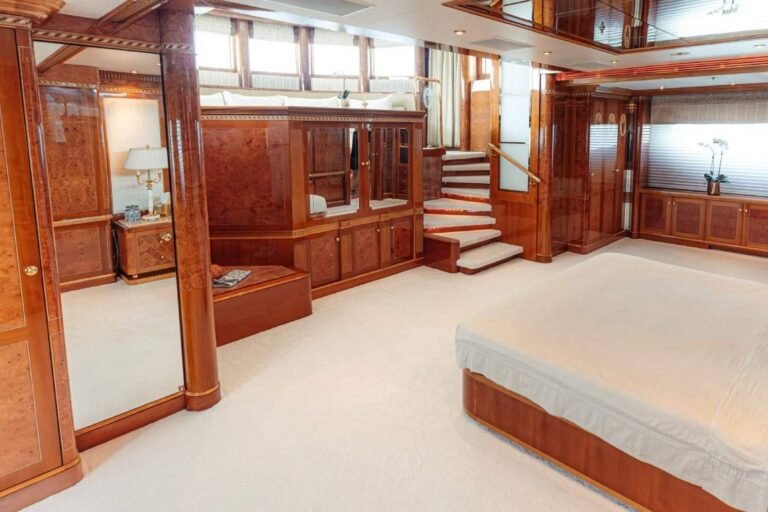 Corporate Yacht Events Abu Dhabi 120 Luxurious indoor saloon of Luxx Beauty 181ft yacht charter with elegant seating and ambient lighting.