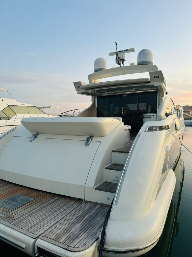 Yacht rental Abu Dhabi | Rent a Yacht Abu Dhabi 31 Private yacht rental in Abu Dhabi – Azimut yacht sailing across the sea at golden hour.