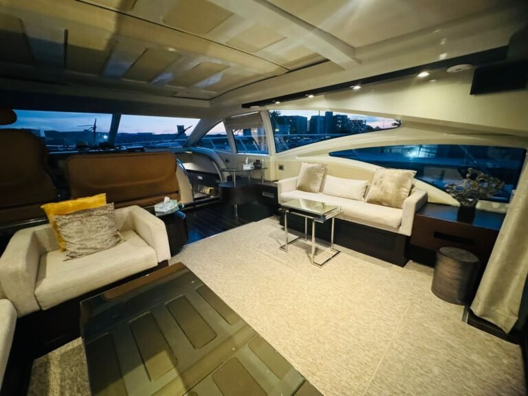 Corniche Yacht Rental Abu Dhabi 32 Exclusive yacht rental Abu Dhabi – luxury motor yacht cruising along the coastline.