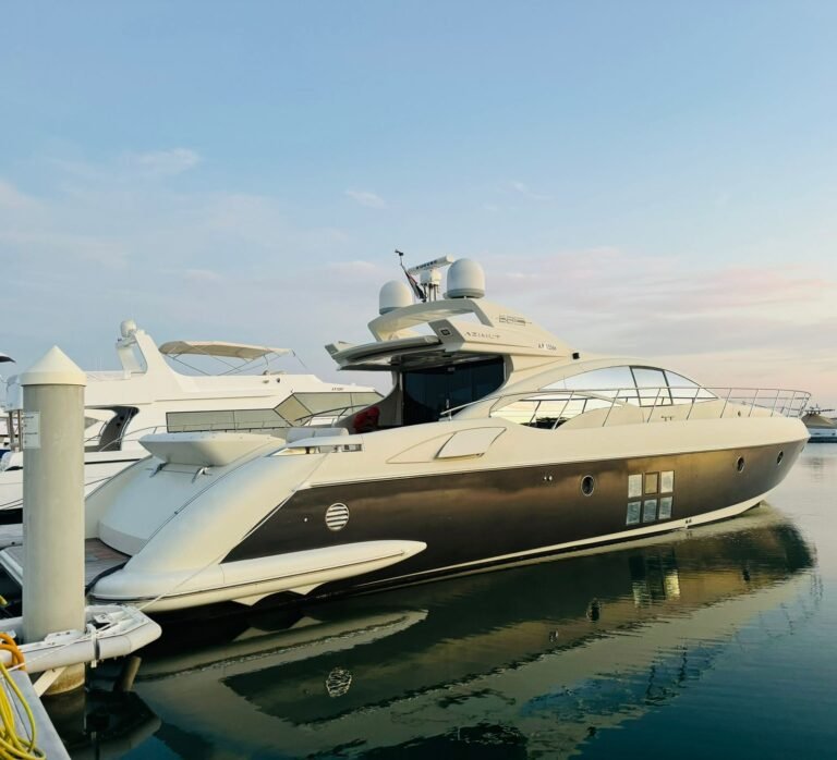Corniche Yacht Rental Abu Dhabi 25 Rent a yacht Abu Dhabi – luxury Azimut yacht cruising at sunset on Arabian waters.