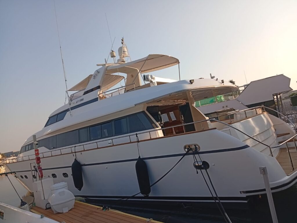 Yacht rental Abu Dhabi | Rent a Yacht Abu Dhabi 84 Raya 88 luxury yacht charter Abu Dhabi docked at the marina with sleek exterior and modern design.